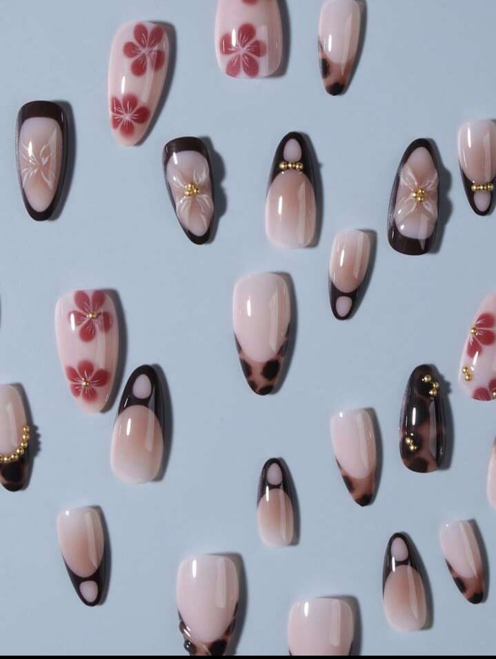 French Acrylic False Nails With Golden Beads. These Medium-Length